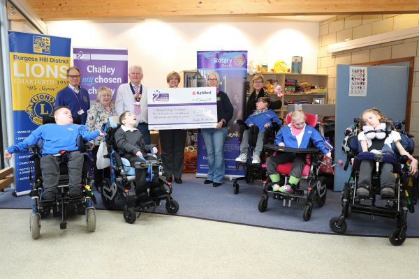 Presentation of cheque to Chailey Heritage by members of the Lions and Rotary Clubs